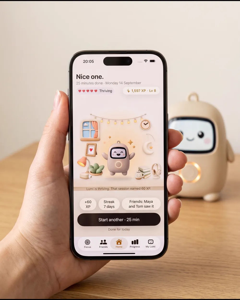 A hand holding a phone showing the Lumi app after a session, Lumi behind it